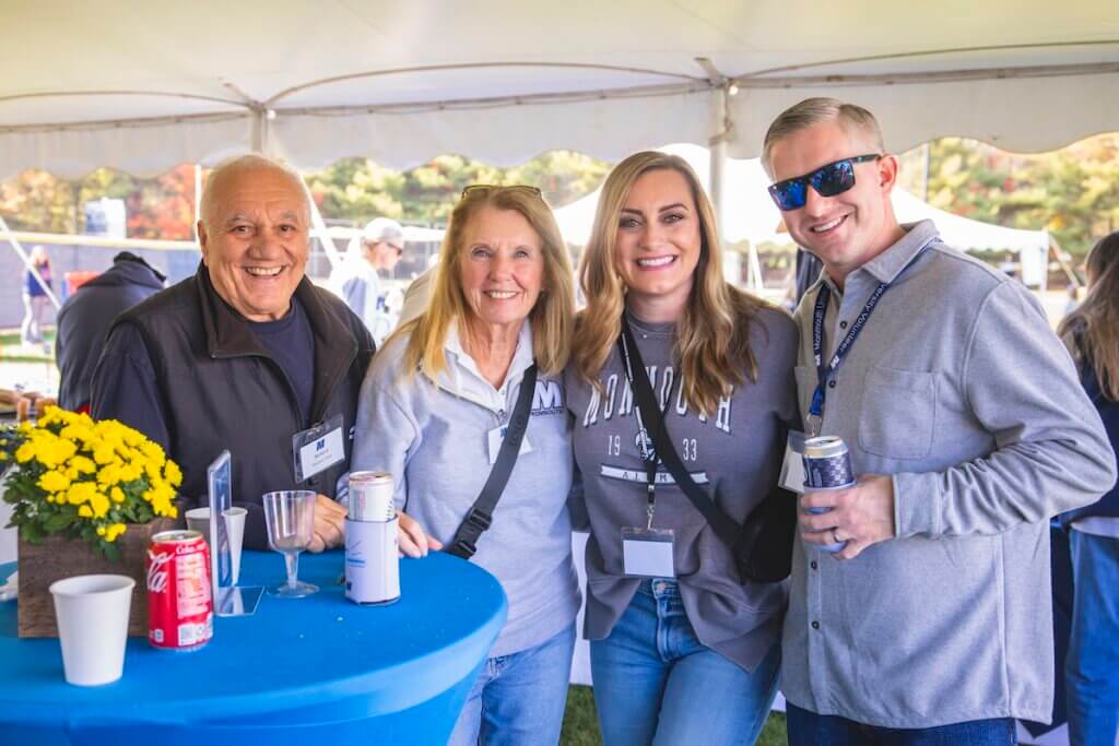 Two couples under a tent