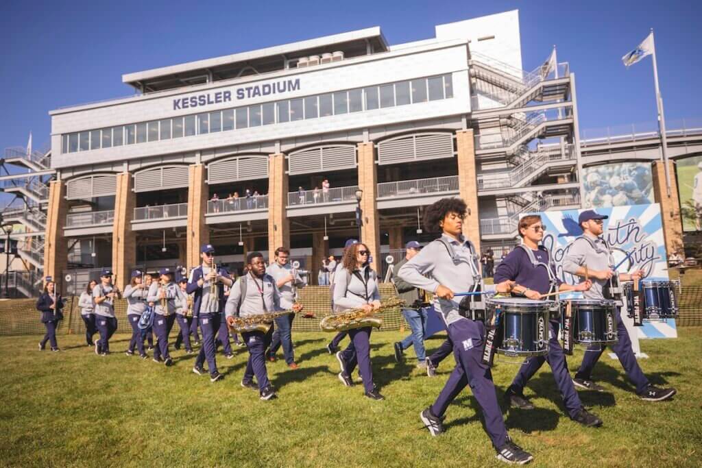 Marching band moving outside the stadium