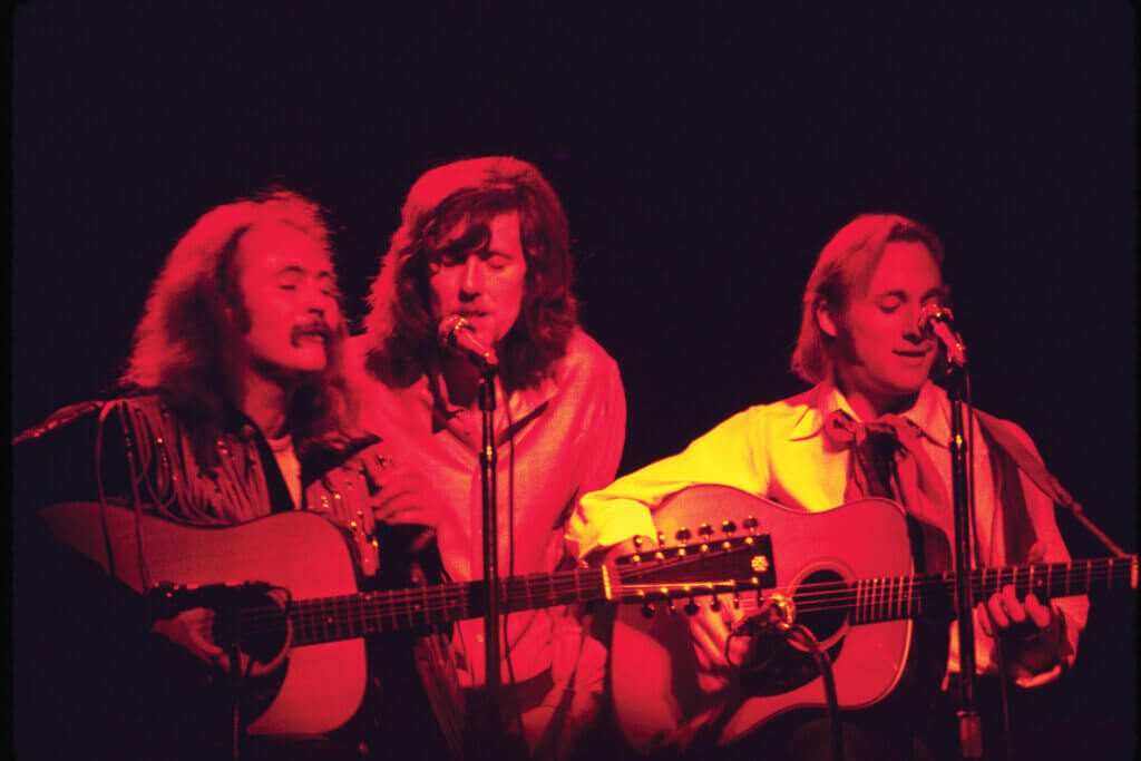 A photo of David Crosby, Graham Nash and Stephen Stills performing at the Fillmore East, New York in September 1969; taken by Mike Frankel.