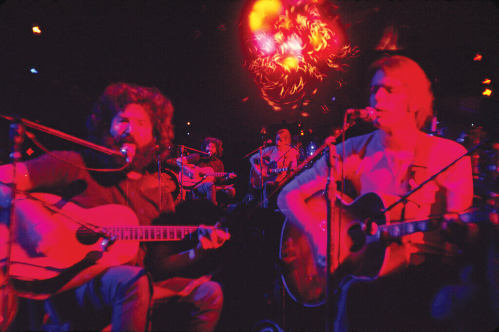 A photo of Jerry Garcia and Bob Weir performing at the Fillmore East, New York in May 1970; taken by Mike Frankel.
