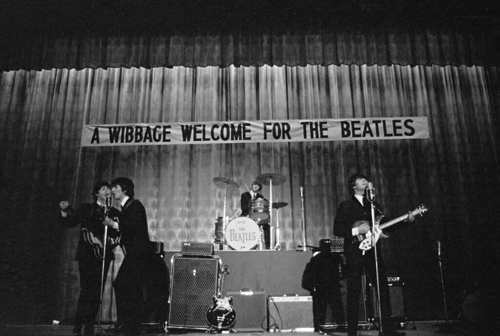 A photo of The Beatles performing at Convention Hall, Philadelphia in September 1964; taken by Mike Frankel.