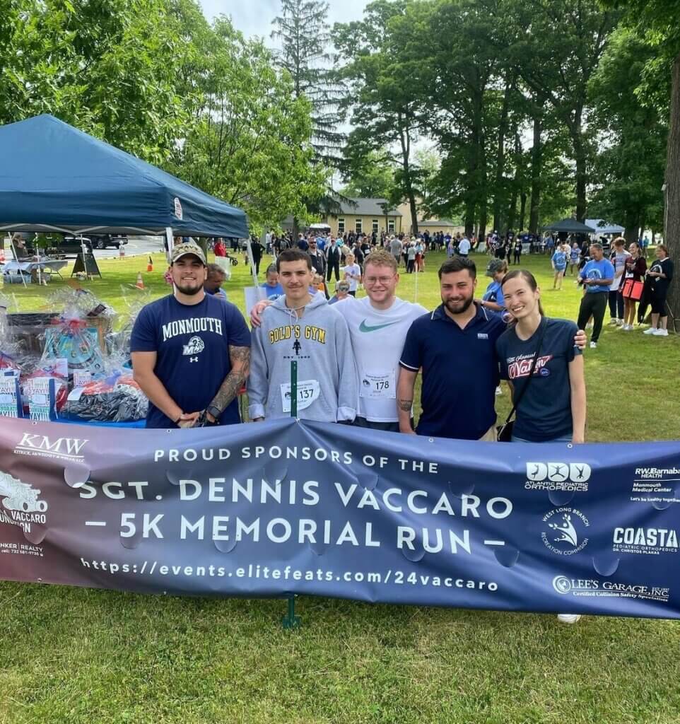 Student veterans tabling for a 5K memorial in memory of Dennis Vaccaro.