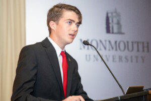 Monmouth University student JackMichael Bruno speaks at the podium during a recent event