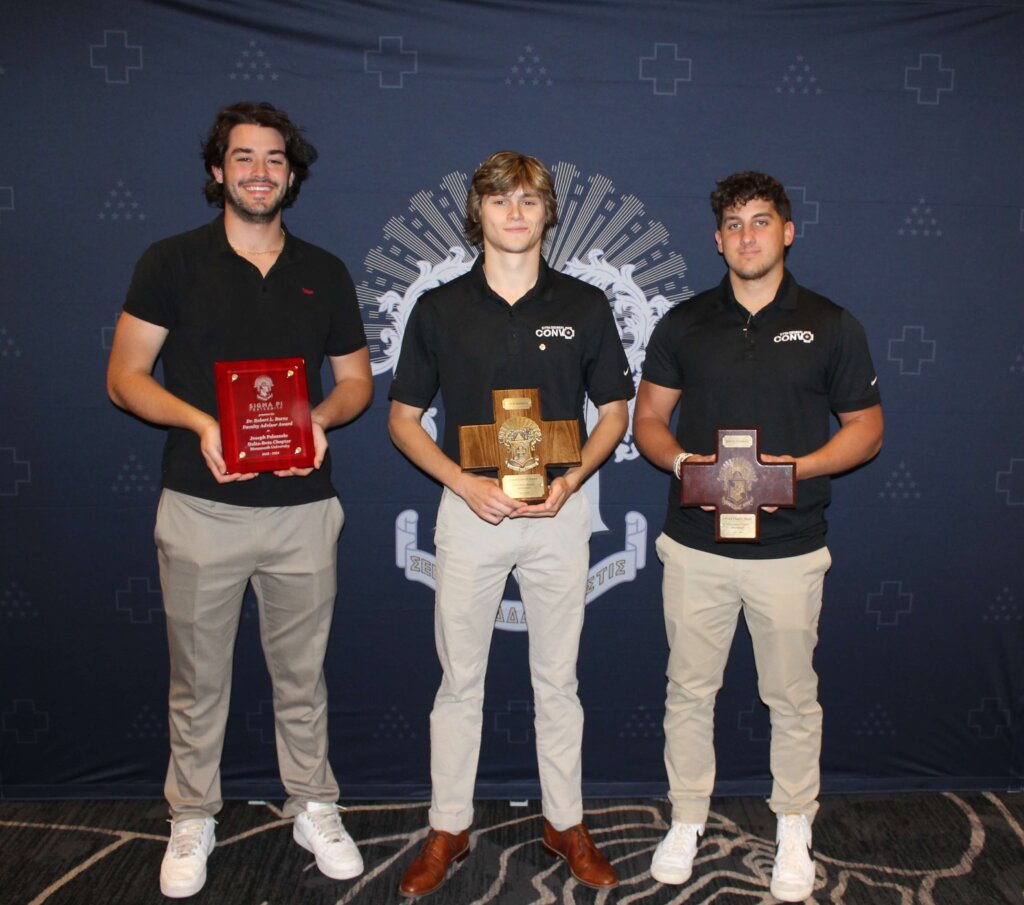 Three members of Sigma Pi fraternity with awards