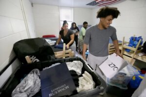 Clark Appling, 17, Newark, moves into his room at Elmwood Hall at Monmouth University in West Long Branch Thursday, August 29, 2024. Thomas P. Costello / Asbury Park Press