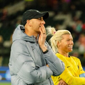 Eric Klenofsky standing with Houston Dash and U.S. Women's National Team goalkeeper Jane Campbell