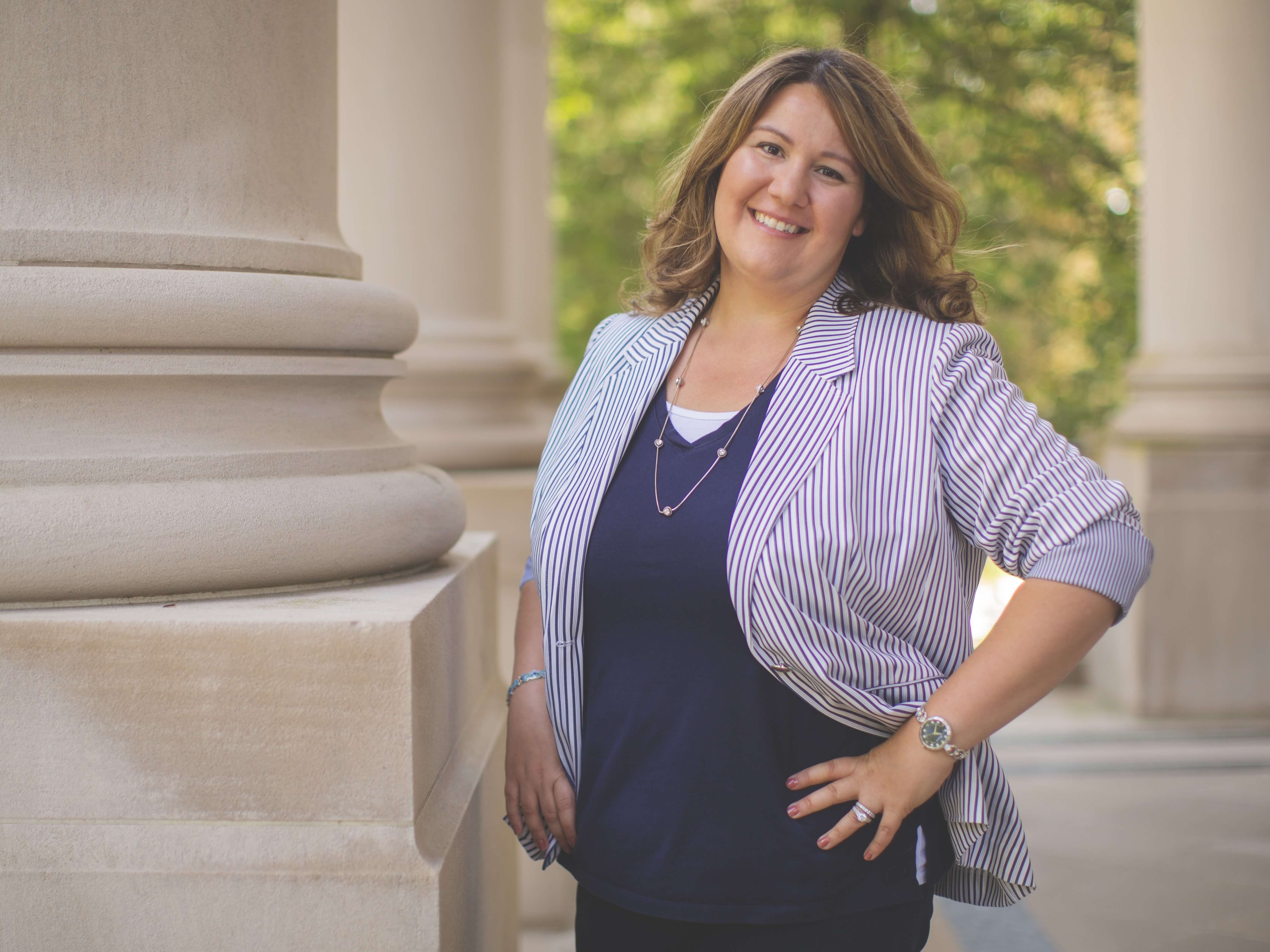 Alyson Pompeo-Fargnoli stands at entrance of Great Hall