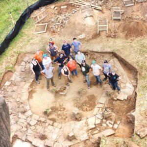 Aerial view of researchers at Twin Lights dig site