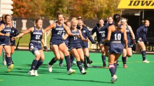 Field hockey team celebrates after milestone win over Iowa