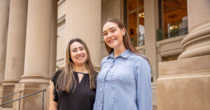 English students Meghan Reilly and Breanna Guinta in front of the Great Hall