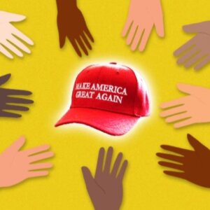 Red hat with Make America Great written on it, surrounded by illustrated hands