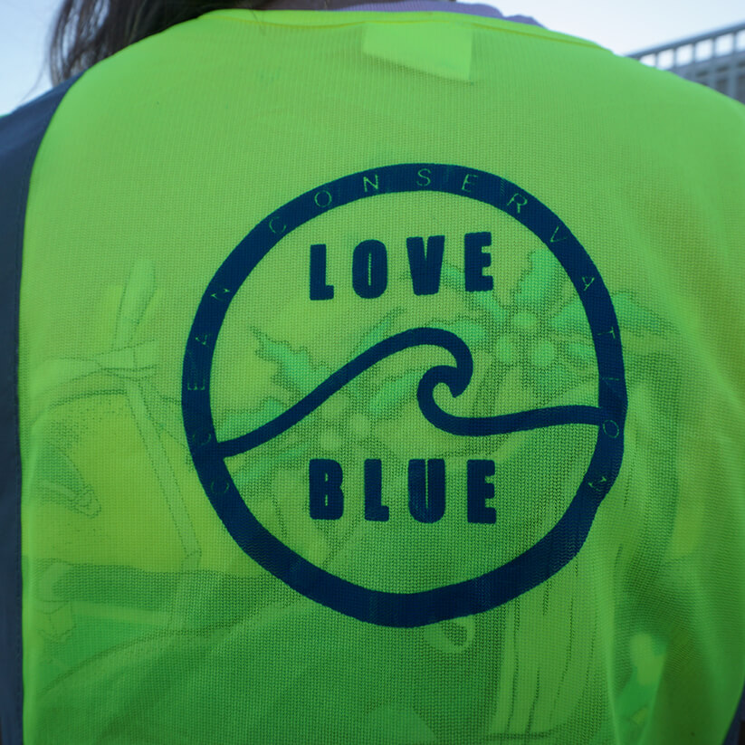 A vest with a Love Blue logo